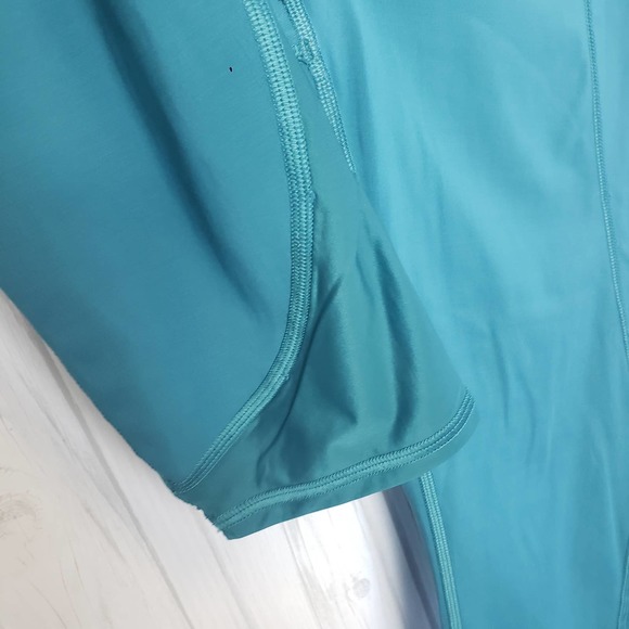 Athleta Size M‎ Lighting Capri Leggings Stash Pockets Mesh Reflective Strip Teal - Picture 7 of 12